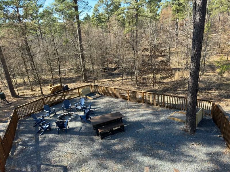 Fun for all ages awaits in our private fenced yard! Gather around the firepit, challenge friends to a game of cornhole, or enjoy a picnic at the table
