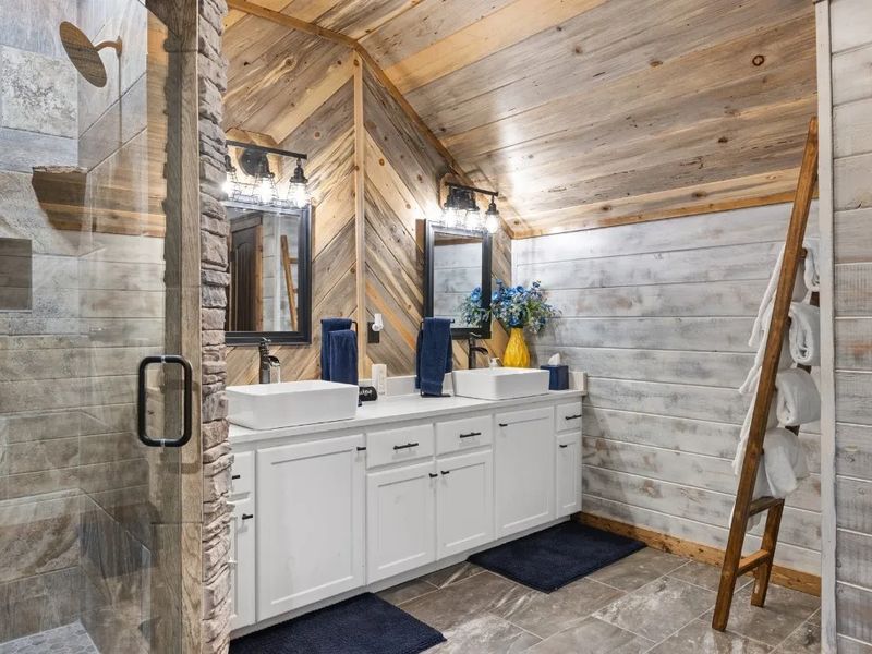 Indulge in modern comfort in our ensuite, boasting double sinks
