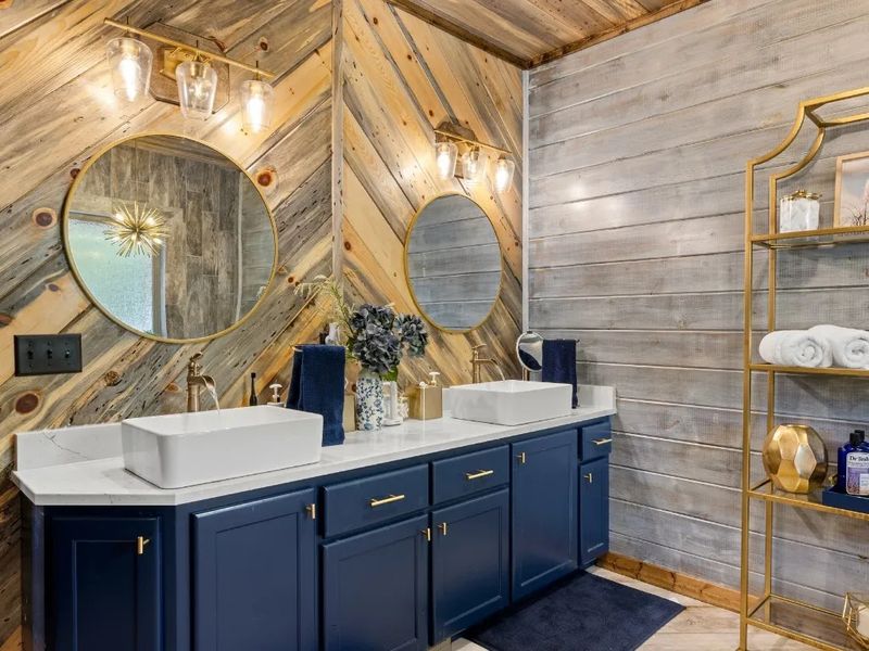 Experience comfort and convenience in our ensuite bathroom, boasting double vanities and ample space to unwind after a day of outdoor adventures