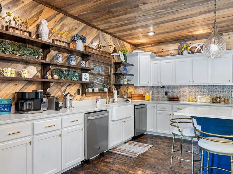 Unleash your inner chef in our dream kitchen, complete with two dishwashers, a warming drawer, and plenty of counter space for effortless meal prep and cleanup