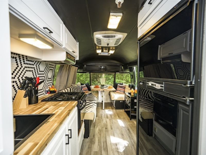 Each of our 6 Airstreams, available as add-ons to your stay, come equipped with fridges, stoves/ovens, bathrooms and beds!