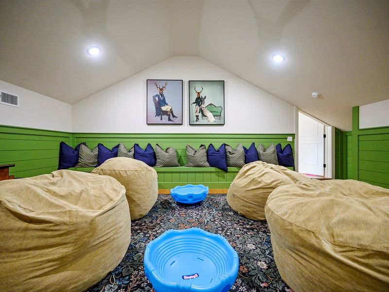Bean bags, bold colors, and tons of space—this loft is where the laughs (and energy!) go wild. 🎉🦌