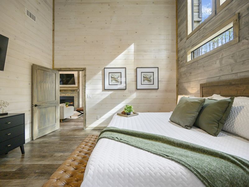 Take a break in this plush king bed and a TV for all your favorite shows!