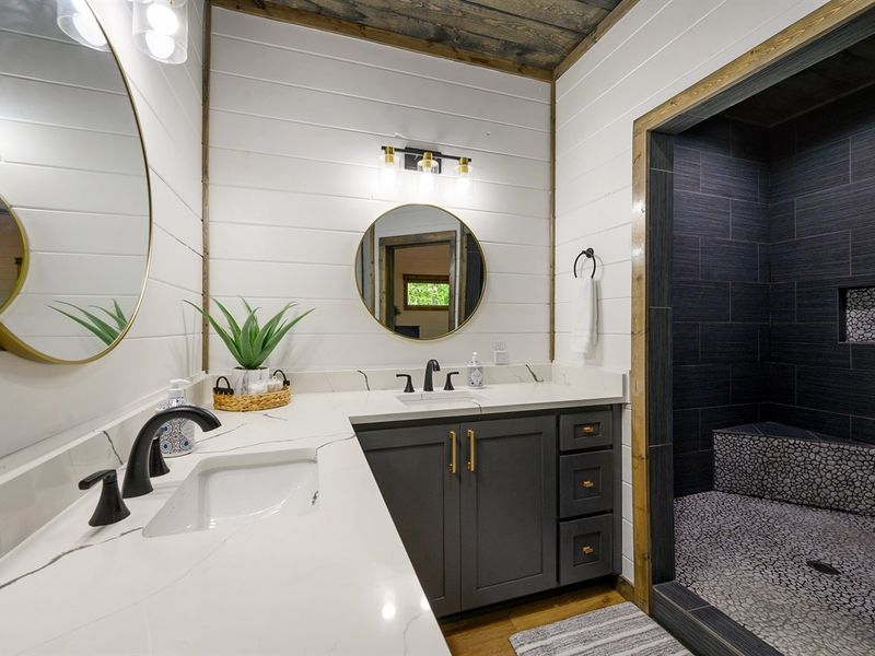 Experience Luxury: Spa-like bathroom with dual sinks and spacious walk-in shower