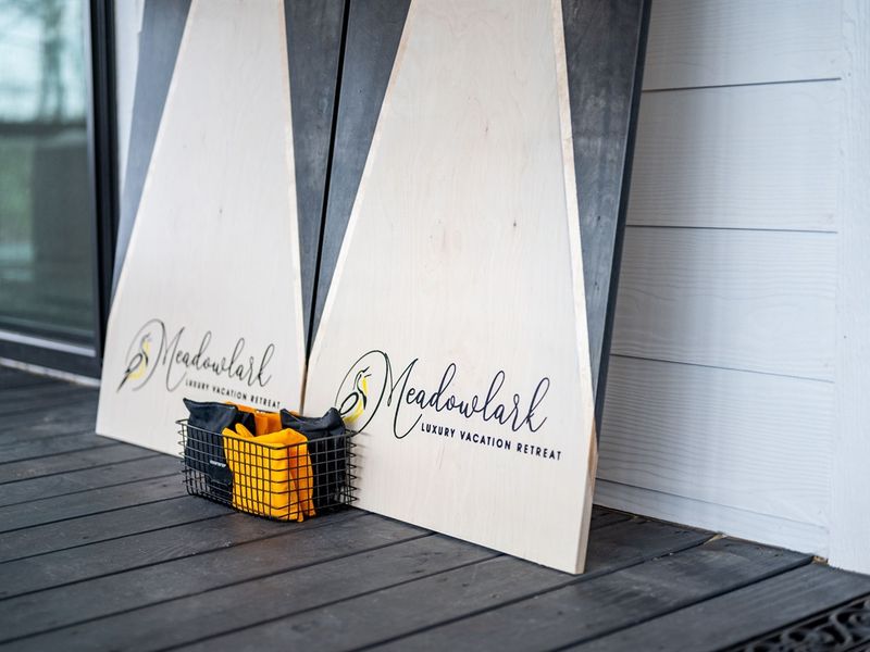 Corn hole and ladder ball provided for outdoor entertainment
