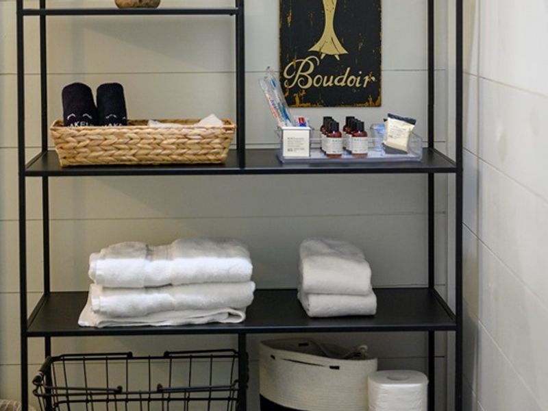Dive into luxury with this stylish shelf setup for your bath essentials!