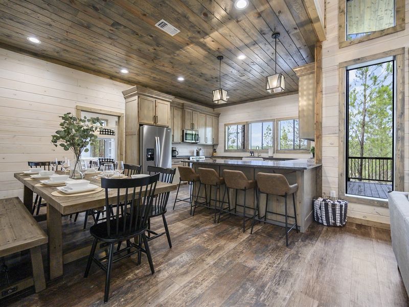 Ample seating at both the table and bar ensures that everyone can gather together for meals or fun-filled game nights.