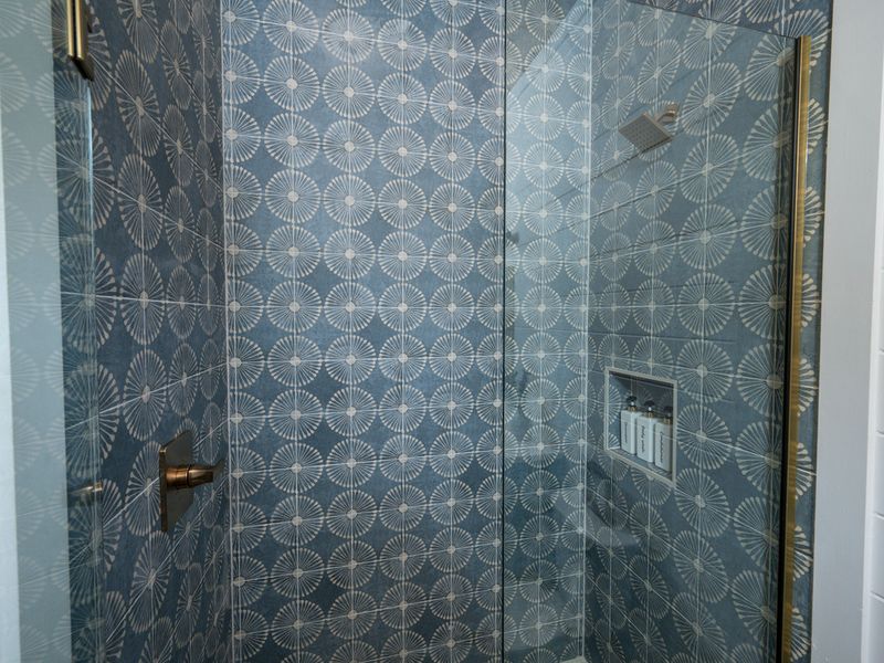 An inviting shower awaits you after your busy day.