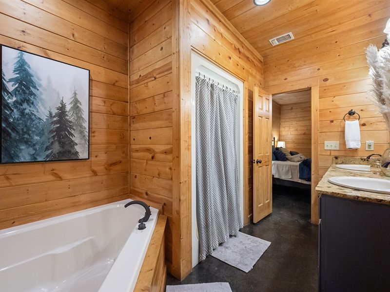 Unwind and relax in the luxurious, oversized soaking tub—your perfect escape after a day of adventure.