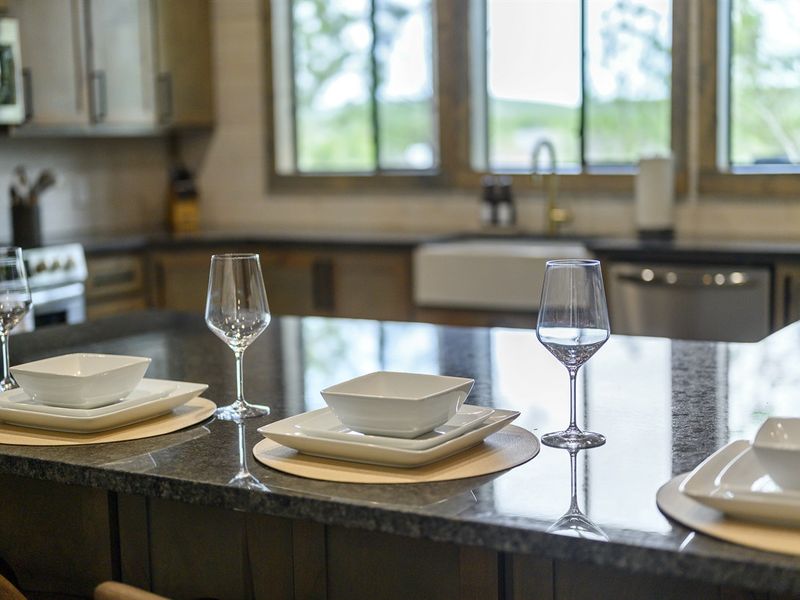 Cheers to a relaxing stay in this charming kitchen space