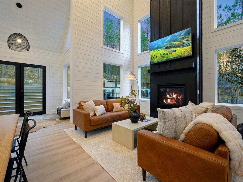Gather around the sleek fireplace for cozy evenings with a fire and your favorite movie.