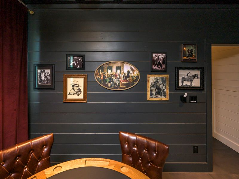 Step into your own private speakeasy, complete with rich leather seating, vintage d&eacute;cor, and a cozy atmosphere perfect for an evening of cards and conversation.