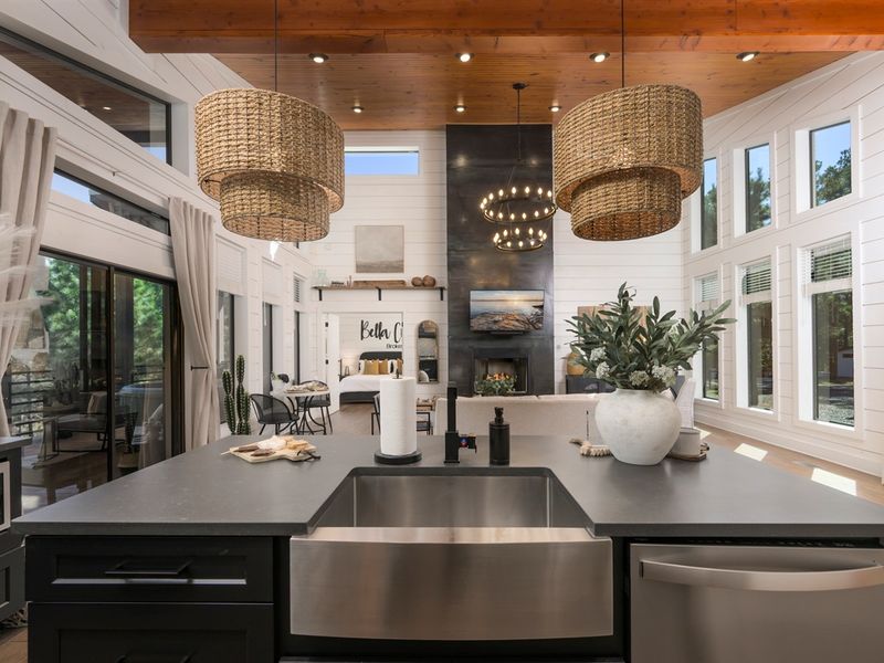 The heart of the home—an open-concept kitchen where modern design meets cozy cabin warmth