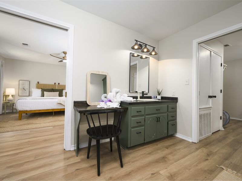"Shared bathroom, conveniently located between Bedrooms 2 & 3."