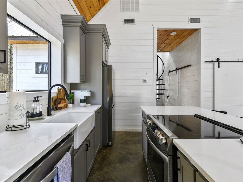 Modern kitchen with stainless steel appliances
