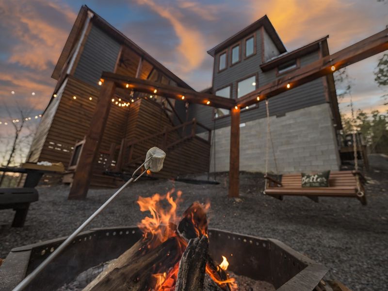 Relax in the Adirondack chairs while roasting s’mores.