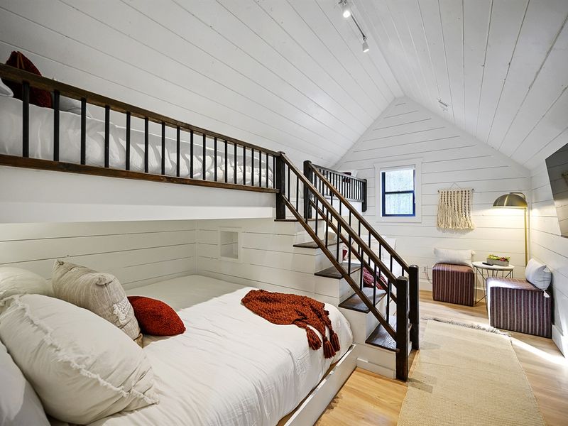 Large bunkroom with kings on the bottom and twins on top.