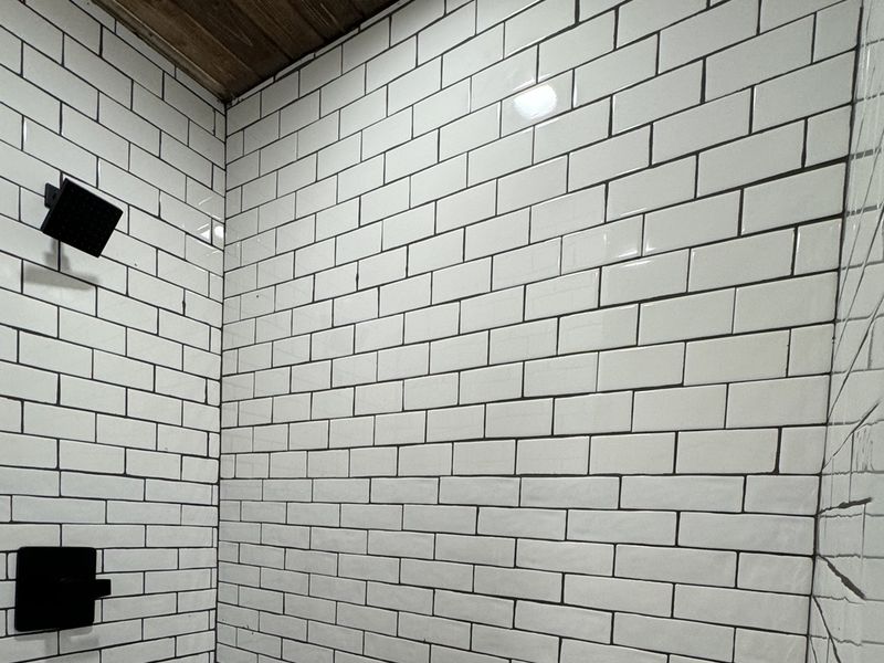 Bunk room's private bath shower area.