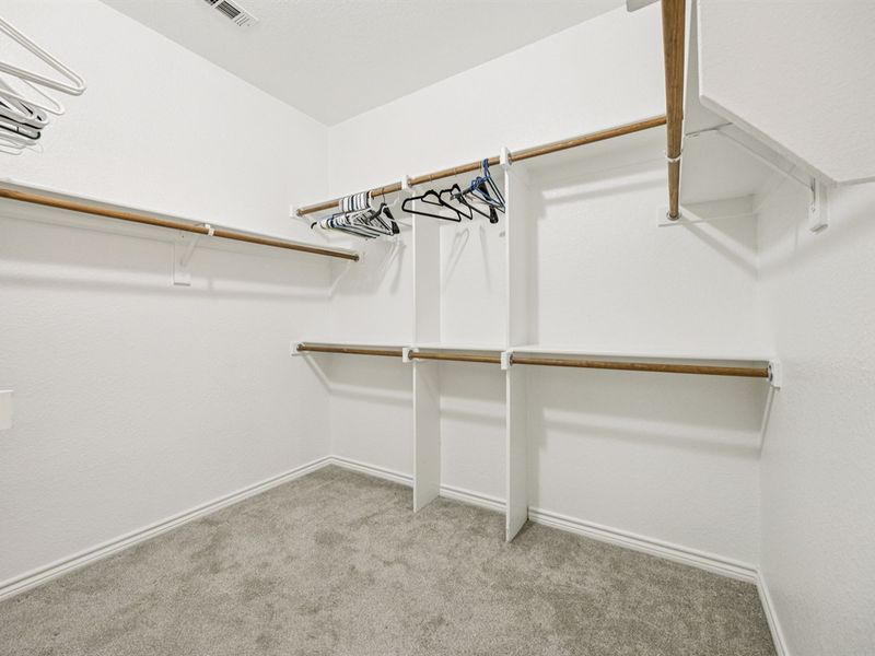 Spacious walk-in closet with room for all your travel essentials.