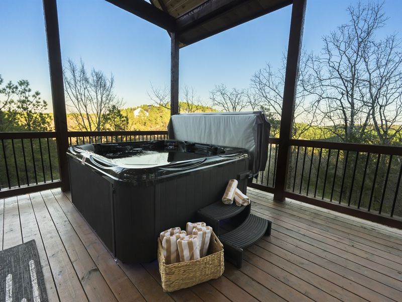 Unwind in the hot tub under a star-filled sky.
