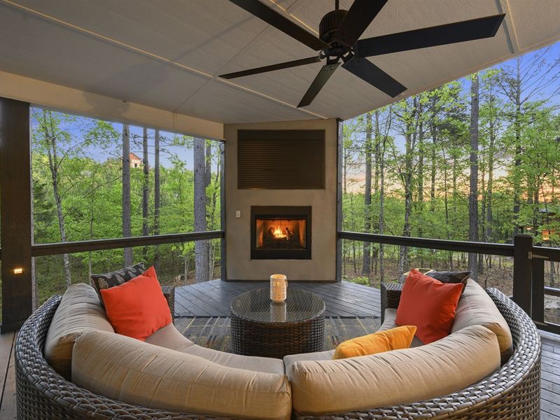 Ample seating on back deck perfect for cozying up by the fire.