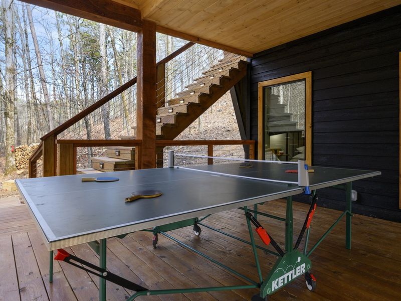 Serve, spin, and score at our cabin's ping pong table, set for friendly competition and family fun.