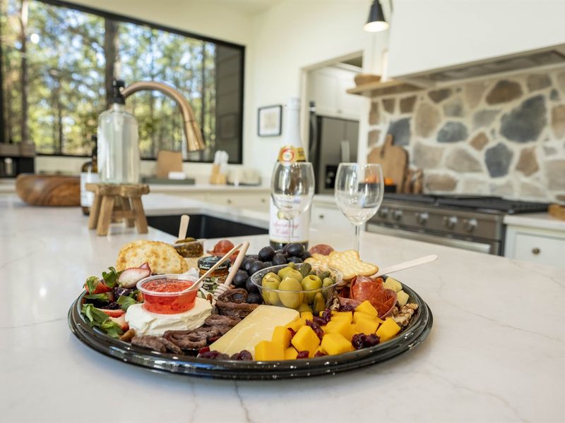 Enjoy a bottle of wine from one of the local wineries. You can also order a charcuterie tray to be delivered.
