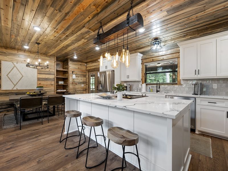 "Morning chats and coffee perks on these comfy counter stools complete the cabin experience."
