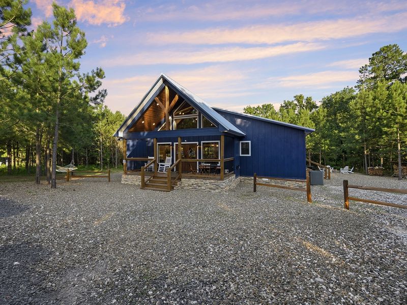 "Nestled among towering pines, our serene cabin offers an escape from the everyday hustle and bustle."