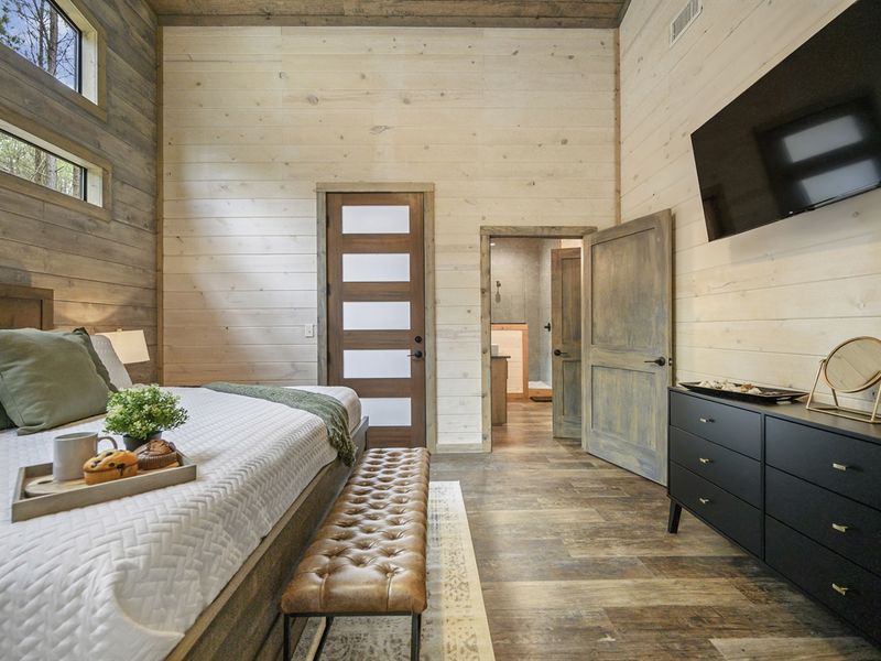 Take a break in this plush king bed and a TV for all your favorite shows!