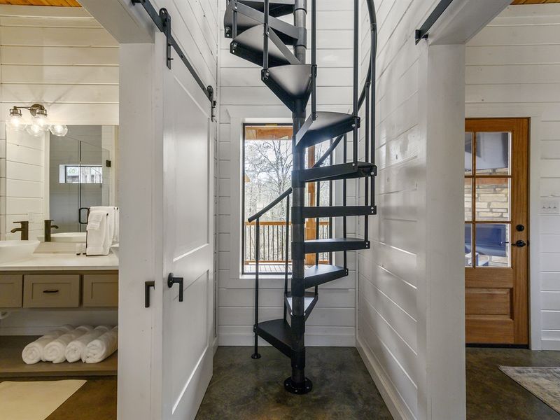 Whether it's a climb to the loft or a playful descent, these stairs add a touch of excitement to your stay.