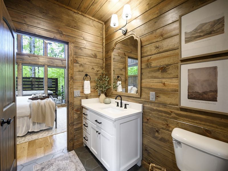 Darling ensuite has a custom vanity