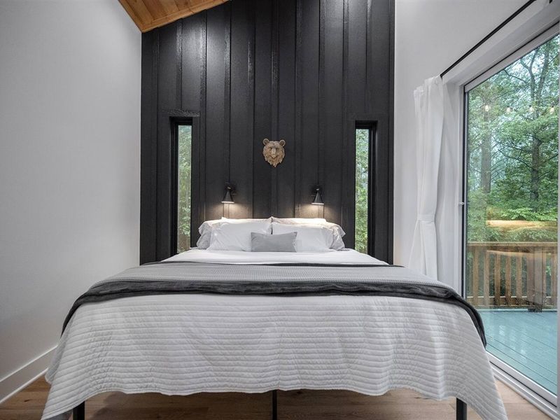 Primary Bedroom 1, equipped with hybrid inner spring + memory foam mattress and luxury linens