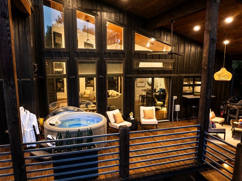 Outdoor living at its best — cozy seating, warm lighting, and pure relaxation