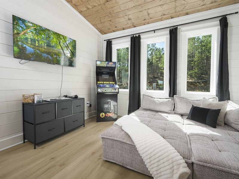 Movie nights and gaming marathons are a must in this cozy haven.