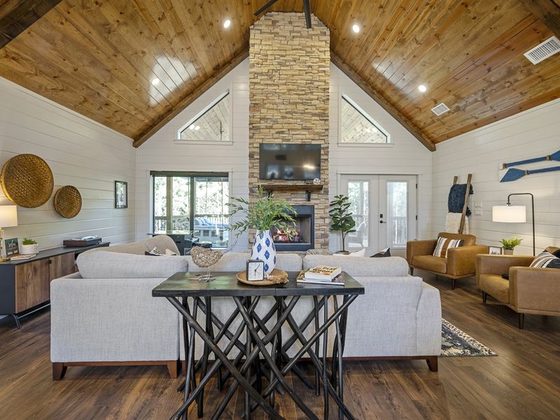 Floor to ceiling stone fireplace