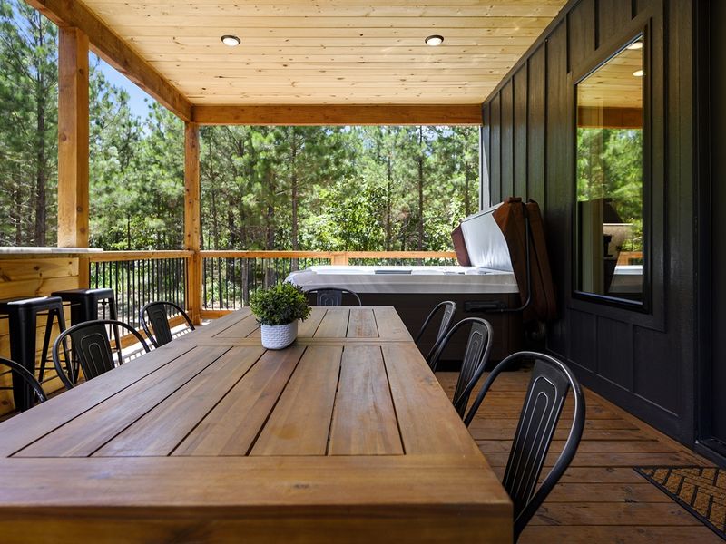 Downstairs deck with hot tub and plenty of seating