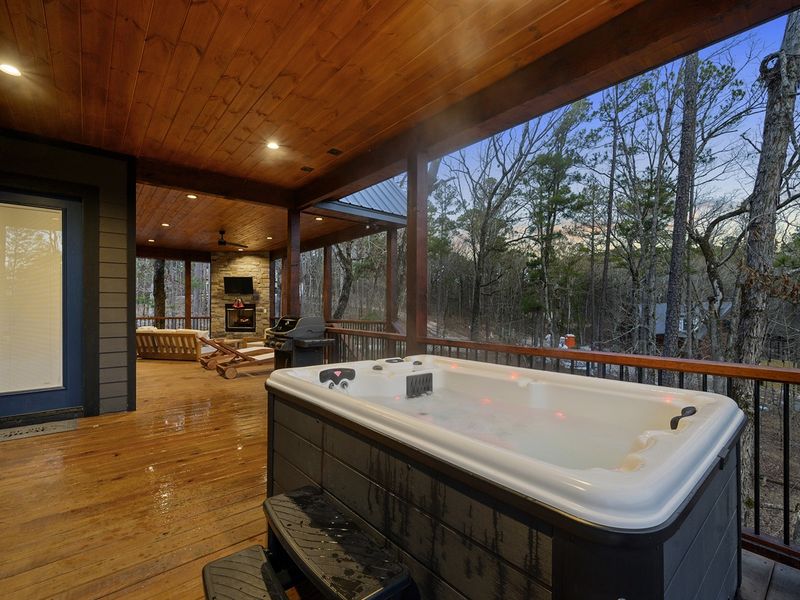 Relax and unwind with friends or family in the hot tub for 4, surrounded by the serene beauty of nature. And don't forget to enjoy the stunning views from our amazing wrap-around deck