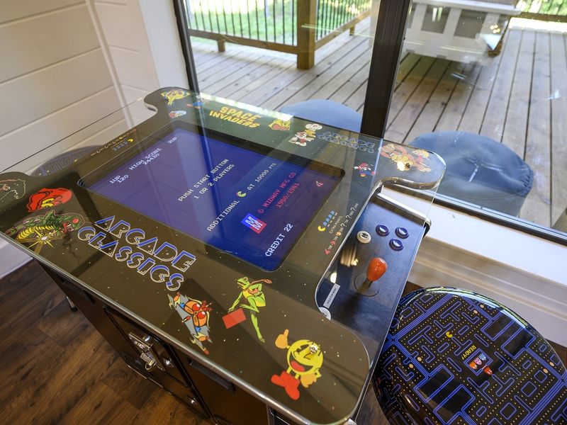 "Embark on a nostalgic journey with our arcade game featuring 412 classic games for all ages.