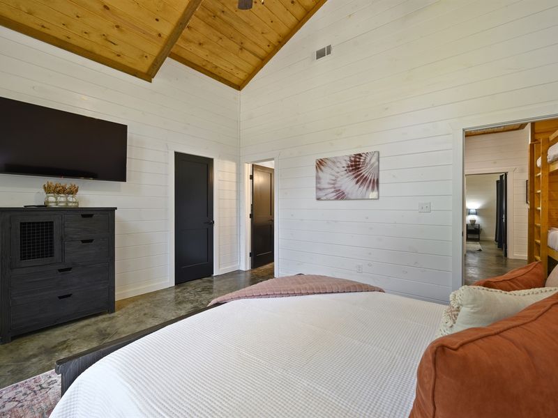 The ensuite boasts a wall mounted television and dresser. Unpack and relax!