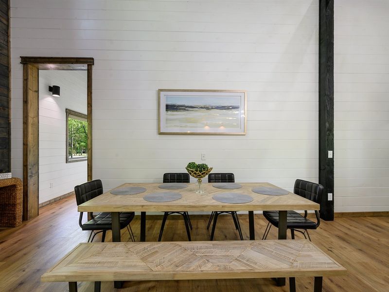 Dine in Style: Enjoy elegant meals at the adjacent dining table to your dream kitchen