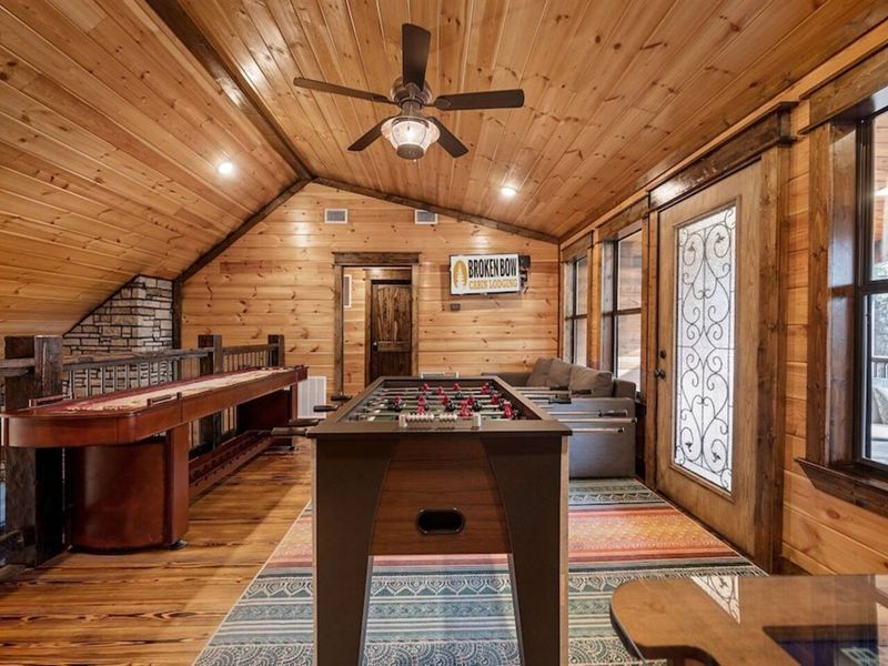 Game room with shuffle board, foosball, SIXTY game counsel!
