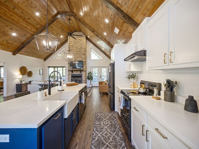 "Prepare delicious meals in our fully-equipped gourmet kitchen with stainless steel appliances."