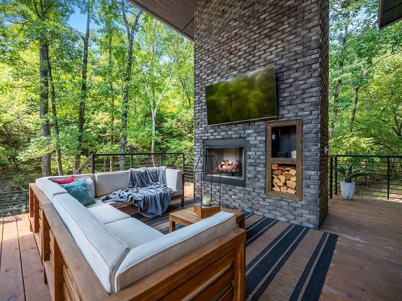 Deckside relaxation with mountain views, Cozy up by the outdoor fire