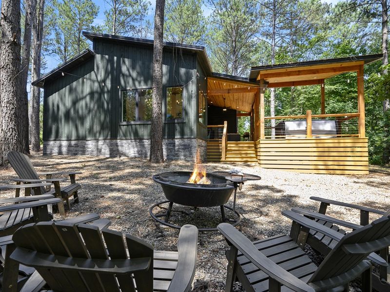 Rear view of cabin amongst the trees