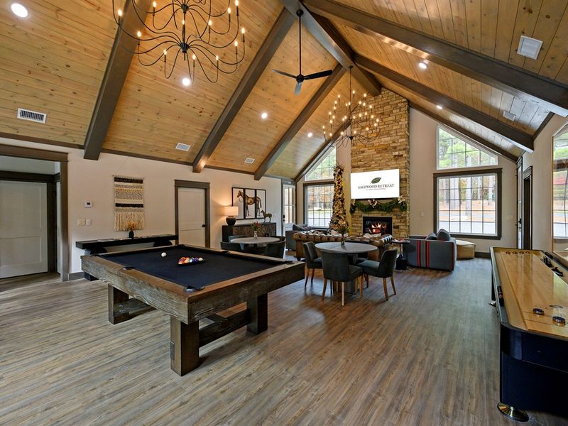 Where cabin style meets friendly competition — enjoy pool, shuffleboard, and cozy fireside hangs in the stunning Three Creeks clubhouse