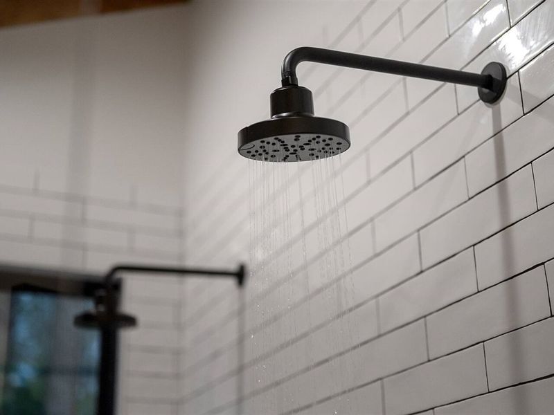 Rain shower heads in Primary Bath 1