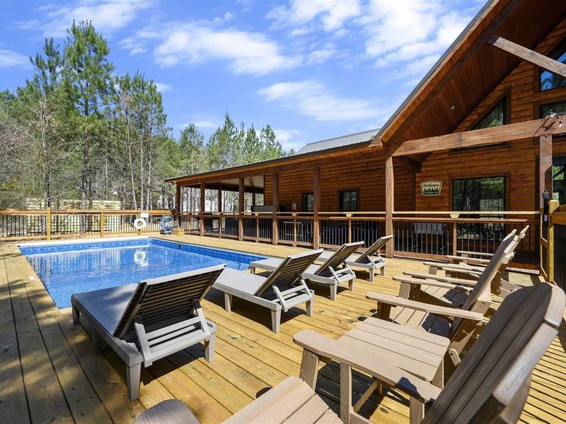 Outdoor Oasis: Dive into relaxation by your private heated saltwater pool surrounded by nature!