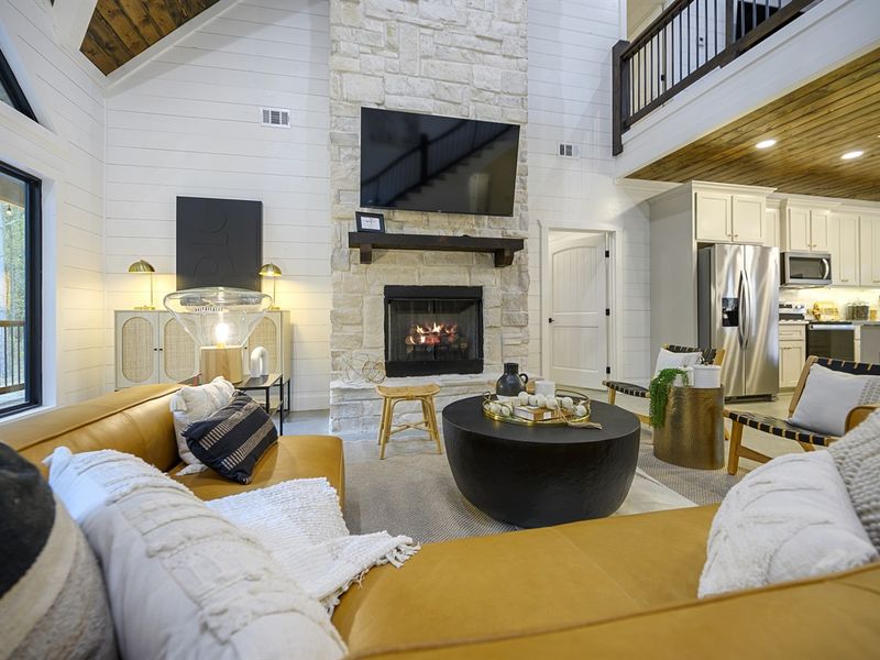 Beautiful large stone fireplace is the centerpiece for your picture perfect stay.