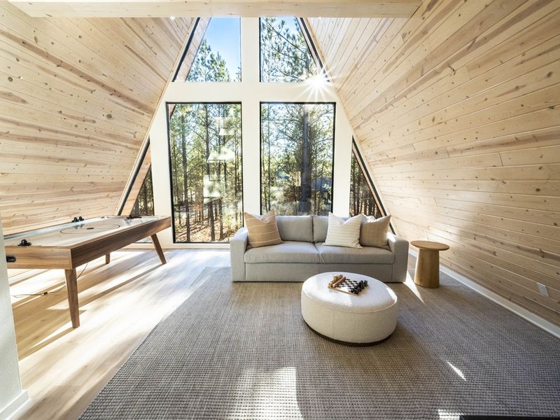"Let sunlight dance across wooden floors, a symphony of light in our rustic retreat."
